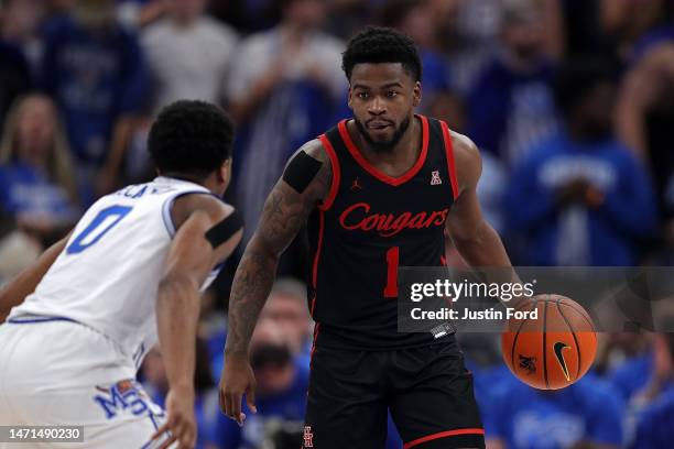 Jamal Shead of the Houston Cougars handles the ball during the second half against Elijah McCadden of the Memphis Tigers at FedExForum on March 05,...