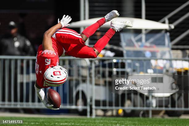 Michael Joseph of the DC Defenders somersaults into the end zone after returning an interception for a touchdown during the first half of the XFL...