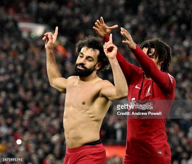 Mohamed Salah of Liverpool celebrates with Trent Alexander-Arnold after scoring the sixth goal during the Premier League match between Liverpool FC...