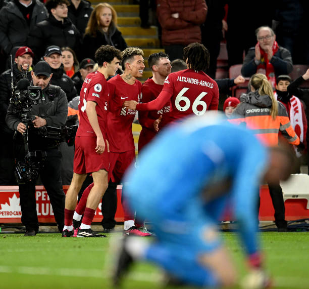 Roberto Firmino of Liverpool celebrates after scoring the seventh goal during the Premier League match between Liverpool FC and Manchester United at...