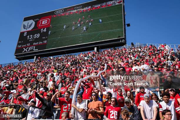 Defenders fans celebrate with a beer cup snake during the first half of the XFL game between the DC Defenders and the St Louis Battlehawks at Audi...