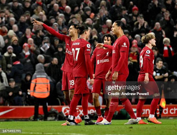 Cody Gakpo of Liverpool celebrates after scoring the third goal during the Premier League match between Liverpool FC and Manchester United at Anfield...