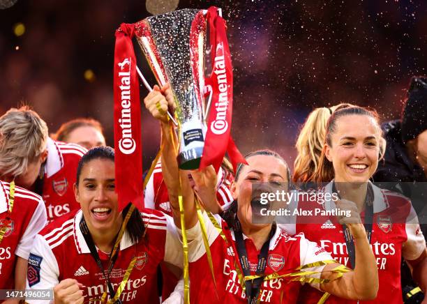 Katie McCabe of Arsenal lifts the trophy during the FA Women's Continental Tyres League Cup Final match between Chelsea and Arsenal at Selhurst Park...