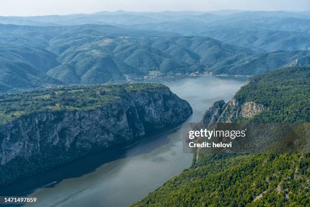 view of danube in djerdap gorge from above - balkans stock pictures, royalty-free photos & images
