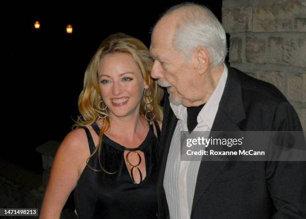 Actress Virginia Madsen poses with filmmaker Robert Altman at The Malibu Celebration of Film Gala in his honor on October 7, 2006 in Malibu,...