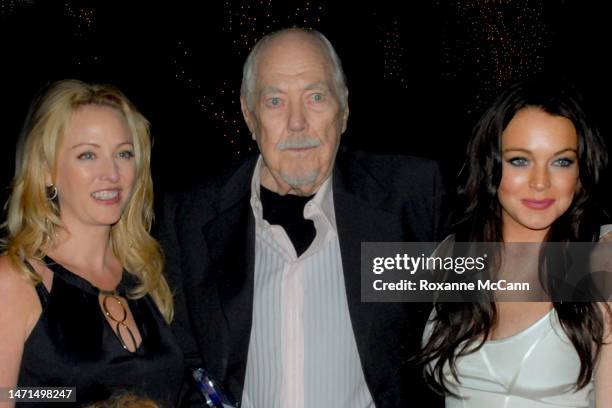 Actress Virginia Madsen poses with filmmaker Robert Altman and actress Lindsay Lohan at The Malibu Celebration of Film Gala in his honor on October...