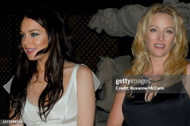Actresses Lindsay Lohan and Virginia Madsen attend The Malibu Celebration of Film Gala in honor of filmmaker Robert Altman on October 7, 2006 in...