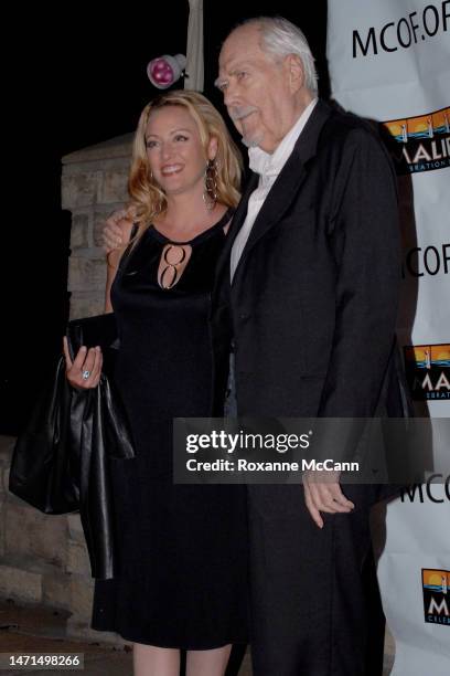 Actress Virginia Madsen and filmmaker Robert Altman arrive at the Malibu Celebration of Film Gala in his honor on October 7, 2006 in Malibu,...