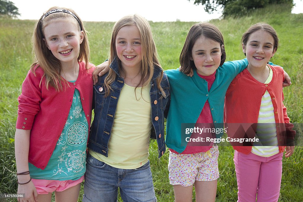 A group of young girls in a field