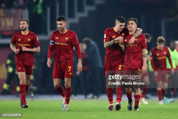 Gianluca Mancini of AS Roma celebrates after scoring the team's first goal with teammate Paulo Dybala during the Serie A match between AS Roma and...