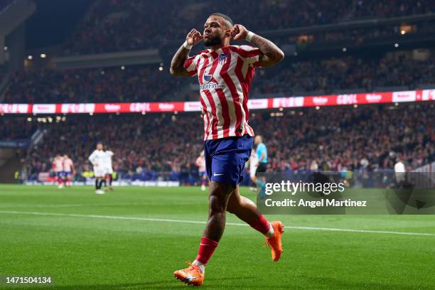 Memphis Depay of Atletico de Madrid celebrates after scoring the team's first goal during the LaLiga Santander match between Atletico de Madrid and...