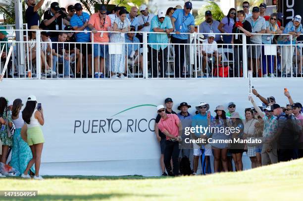 Derek Ernst of the United States hits his third shot on the 18th hole during the final round of the Puerto Rico Open at Grand Reserve Golf Club on...