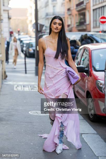 Neelam Gill wears pink ruffled dress, bag outside Victoria Beckham during the Paris Fashion Week - Womenswear Fall Winter 2023 2024 : Day Five on...