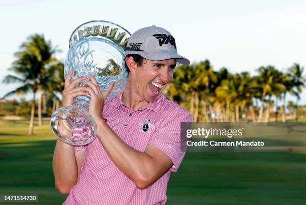 Nico Echavarria of Columbia poses with the trophy on the 18th green after winning the Puerto Rico Open at Grand Reserve Golf Club on March 05, 2023...