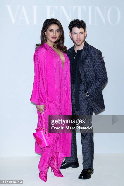 Priyanka Chopra Jonas and Nick Jonas attend the Valentino Womenswear Fall Winter 2023-2024 show as part of Paris Fashion Week on March 05, 2023 in...