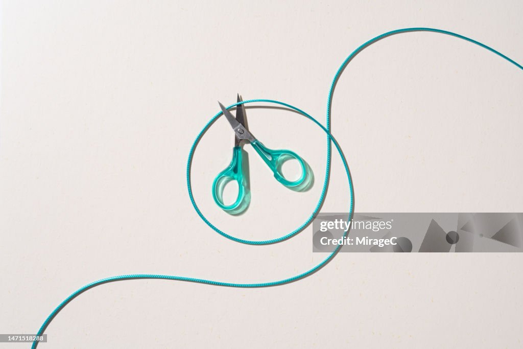 Scissors Cut the Surrounding Rope