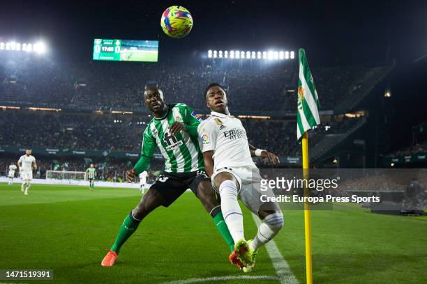 Vinicius Junior of Real Madrid and Youssouf Sabaly of Real Betis in action during the spanish league, La Liga Santander, football match played...