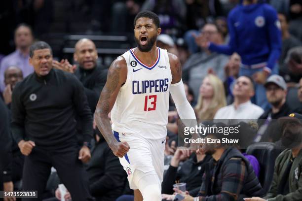 Paul George of the LA Clippers reacts during their game against the Sacramento Kings at Golden 1 Center on March 03, 2023 in Sacramento, California....