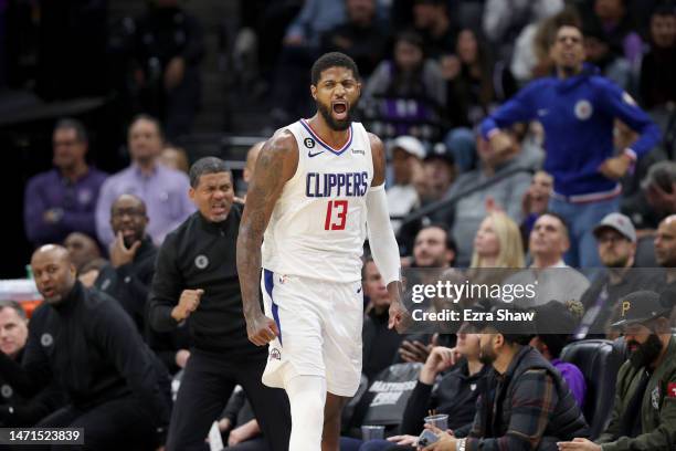 Paul George of the LA Clippers reacts during their game against the Sacramento Kings at Golden 1 Center on March 03, 2023 in Sacramento, California....