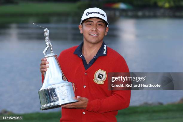 Kurt Kitayama of the United States celebrates with the trophy after winning during the final round of the Arnold Palmer Invitational presented by...