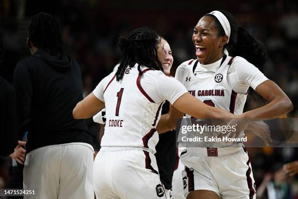 Zia Cooke hugs Bree Hall of the South Carolina Gamecocks after the Tennessee Lady Vols call a time out in the third quarter during the championship...