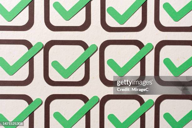 green check marks in arranged check boxes flat lay - tick stock pictures, royalty-free photos & images