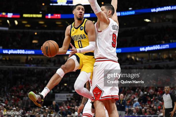 Tyrese Haliburton of the Indiana Pacers goes up for a shot in the second half against Nikola Vucevic at United Center on March 05, 2023 in Chicago,...