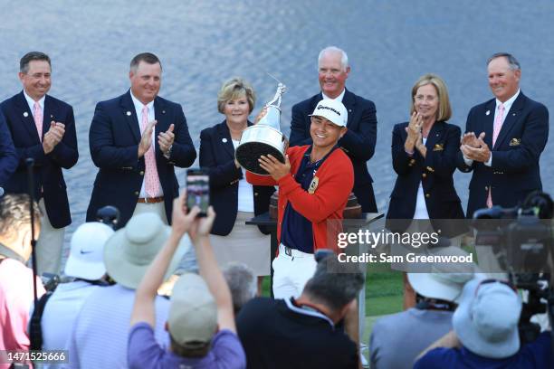 Kurt Kitayama of the United States celebrates with the trophy at the trophy ceremony after winning during the final round of the Arnold Palmer...