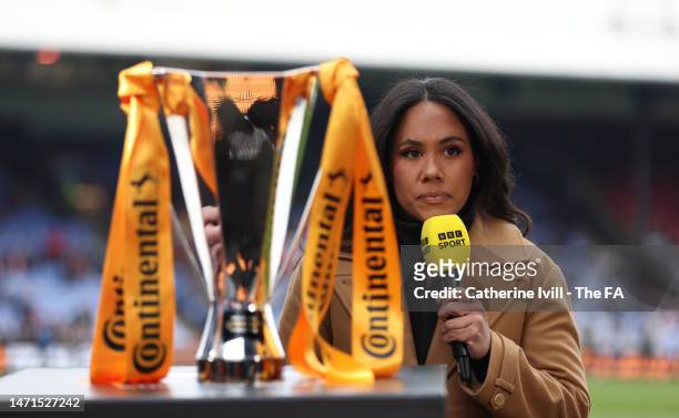 Presenter and former Arsenal player Alex Scott with the trophy ahead of the FA Women's Continental Tyres League Cup Final match between Chelsea and...