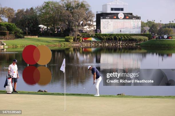 General view is seen as Scottie Scheffler of the United States chips to the 18th green during the final round of the Arnold Palmer Invitational...