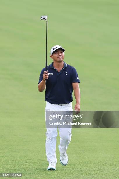 Kurt Kitayama of the United States acknowledges the fans as he approaches the 18th green during the final round of the Arnold Palmer Invitational...