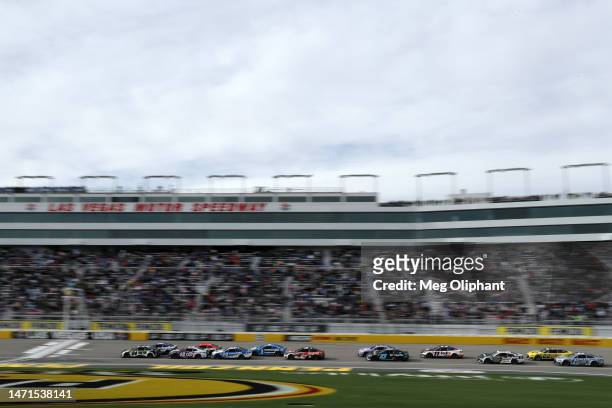 William Byron, driver of the RaptorTough.com Chevrolet, leads the field during the NASCAR Cup Series Pennzoil 400 at Las Vegas Motor Speedway on...