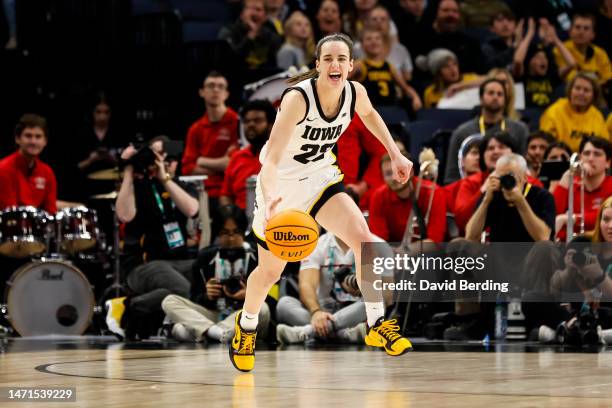 Caitlin Clark of the Iowa Hawkeyes celebrates her triple-double against the Ohio State Buckeyes in the second half of the championship game of the...
