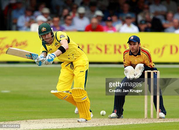 Michael Clarke of Australia plays down to long on during the tour match between Essex and Australia at Ford County Ground on June 26, 2012 in...