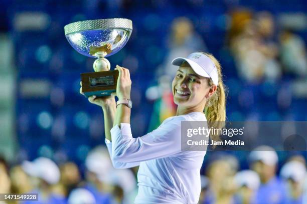 Donna Vekic of Croatia lifts the champion thophy after winning the final round singles match against Caroline Garcia of France as part of the GNP...