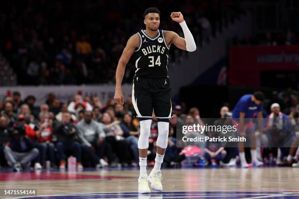 Giannis Antetokounmpo of the Milwaukee Bucks celebrates against the Washington Wizards during the second half at Capital One Arena on March 5, 2023...