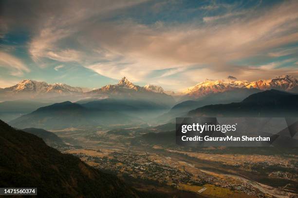 majestic annapurna in sunset - annapurna range stock pictures, royalty-free photos & images