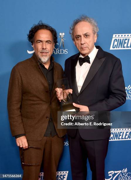 Darius Khondji, recipient of the International award, poses with Alejandro González Iñárritu in the press room during the 37th Annual American...