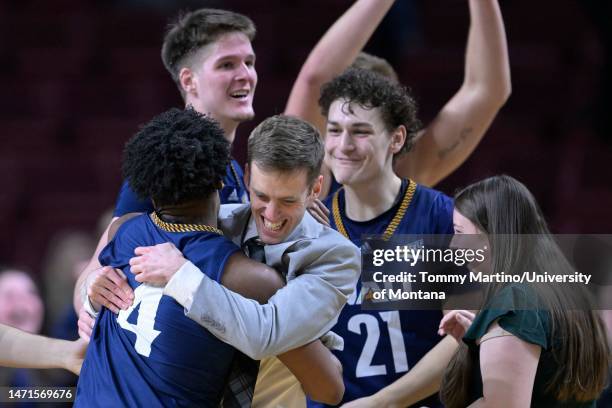 Members of the Northern Arizona Lumberjacks celebrate with Oakland Fort of the Northern Arizona Lumberjacks after Fort sunk a 3-pointer to beat the...