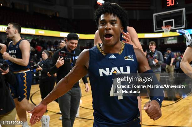 Oakland Fort of the Northern Arizona Lumberjacks walks off the court after sinking a 3-pointer to beat the Eastern Washington Eagles 81-80 in the...