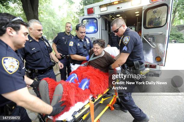 Embassed Elmo An emotionally distrubed man dressed as Elmo is taken away by... News ...