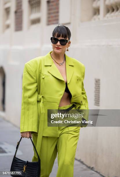Gili Biegun wears green oversized blazer, pants, Y outside Ottolinger Paris Fashion Week - Womenswear Fall Winter 2023 2024 : Day Seven on March 05,...