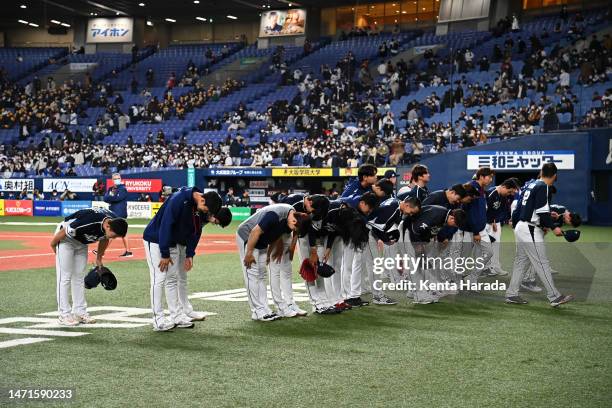 Korea players bow to fans to applaud fans after the World Baseball Classic exhibition game between Korea and Orix Buffaloes at Kyocera Dome Osaka on...