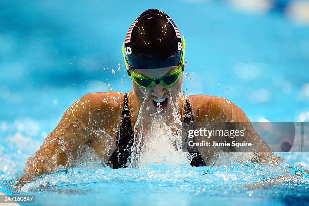 Amanda Beard competes in preliminary heat 16 of the Women's 100 m Breaststroke during Day Two of the 2012 U.S. Olympic Swimming Team Trials at...