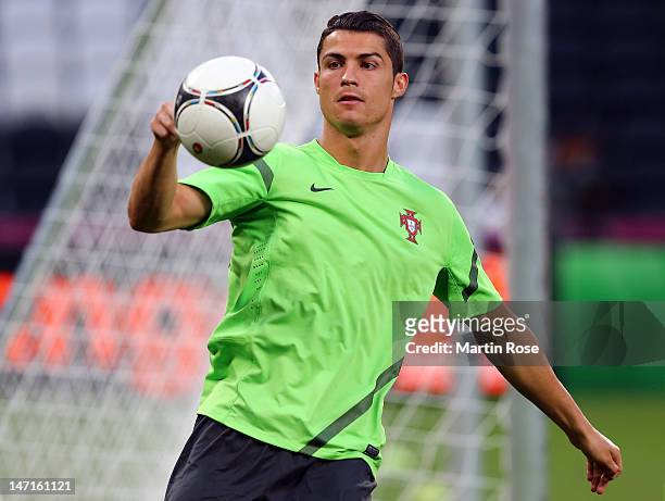 Cristiano Ronaldo plays the ball during a Portugal training session ahead of UEFA Euro 2012 Semi-Final 2012 at Donbass Arena on June 26, 2012 in...