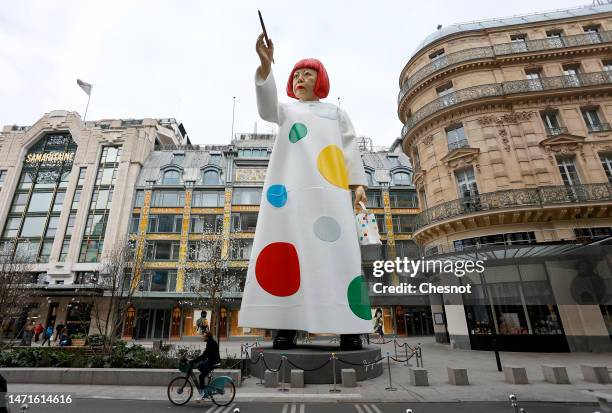 Huge sculpture in the likeness of Yayoi Kusama is erected between the headquarters of the Maison Louis Vuitton and the Samaritaine department store...