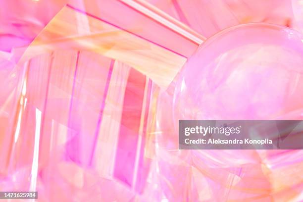 abstract 3d glass sphere, crystal ball on ethereal pastel yellow, orange, cream, magenta, pink holographic background - translucent glass stock pictures, royalty-free photos & images