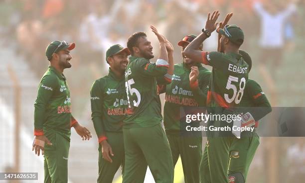 Bangladesh bowler Shakib Al Hasan celebrates with team mates after taking the wicket of Jason Roy during the 3rd ODI between Bangladesh and England...