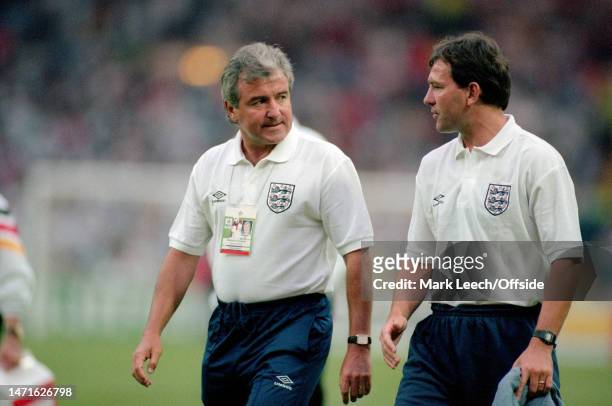 June 1996, London - 1996 European Championships, Semi-Final - Germany v England - England manager Terry Venables leaves the field with Bryan Robson.