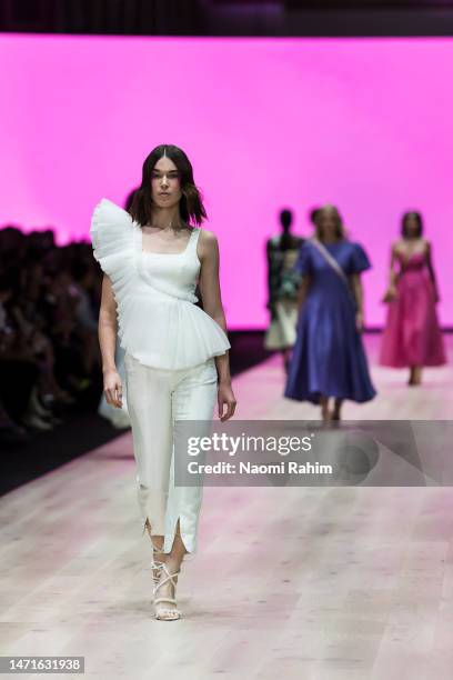 Model showcases designs by Aje during the Utopia Runway at Melbourne Fashion Festival on March 06, 2023 in Melbourne, Australia.